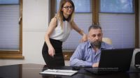 Helpful Cute Assistant Teaching Her Boss How To Use A Computer