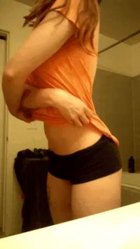 Stripping Off An Orange Shirt