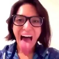 Big Glasses, Bigger Tongue