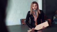 Chloe Moretz Holding A Paddle