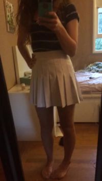 Pulling Up Her Skirt