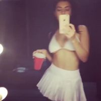 Charli XCX Dancing And Giving Us A Peek Under Her Short Skirt
