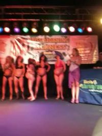 A Contestant In The "Miss Morning Sickness" Pregnant Beauty Pageant
