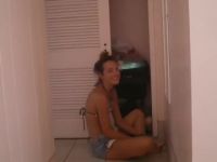 Giggling Gal In Cutoffs And Bikini Top