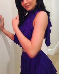 Posing In Purple Outfit