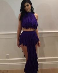 Turning In Purple Outfit