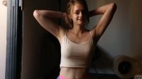 Dahlia Polk Poking Through Her Top