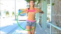 Roxy Raine At Metro Stop With Hula Hoop