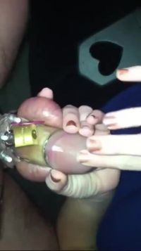 Playing With His Locked Cock