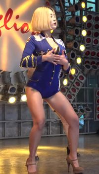 Asian Girl Dancing On Stage In Tight One Piece Outfit